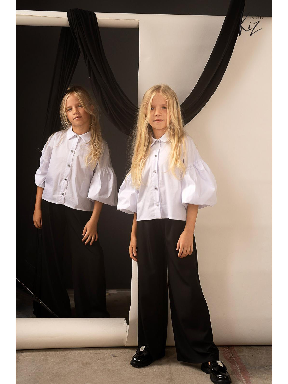 Spodnie czarne z tkaniny szerokie i luźne Kiz by Kids